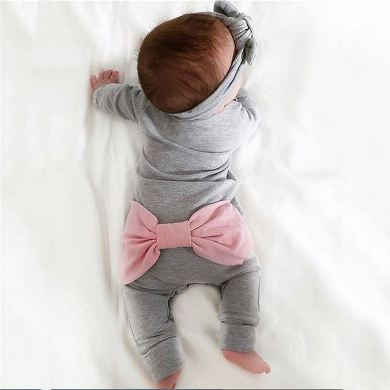 Ava's sweet baby bum-bow sleeper